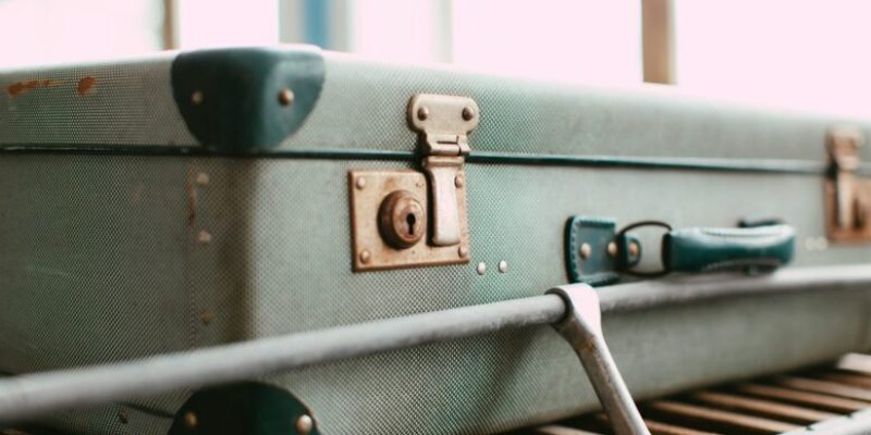 a suitcase on a shelf